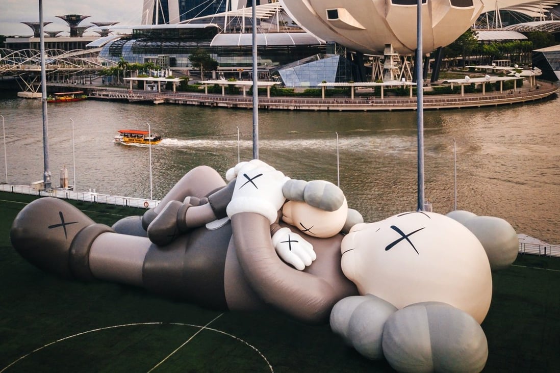 US artist Kaws’ Companion on display on a floating platform in Singapore. With an injunction against its exhibition lifted, art lovers are free to view the 42-metre inflatable sculpture again. Photo: courtesy of Facebook/AllRightsReserved Limited