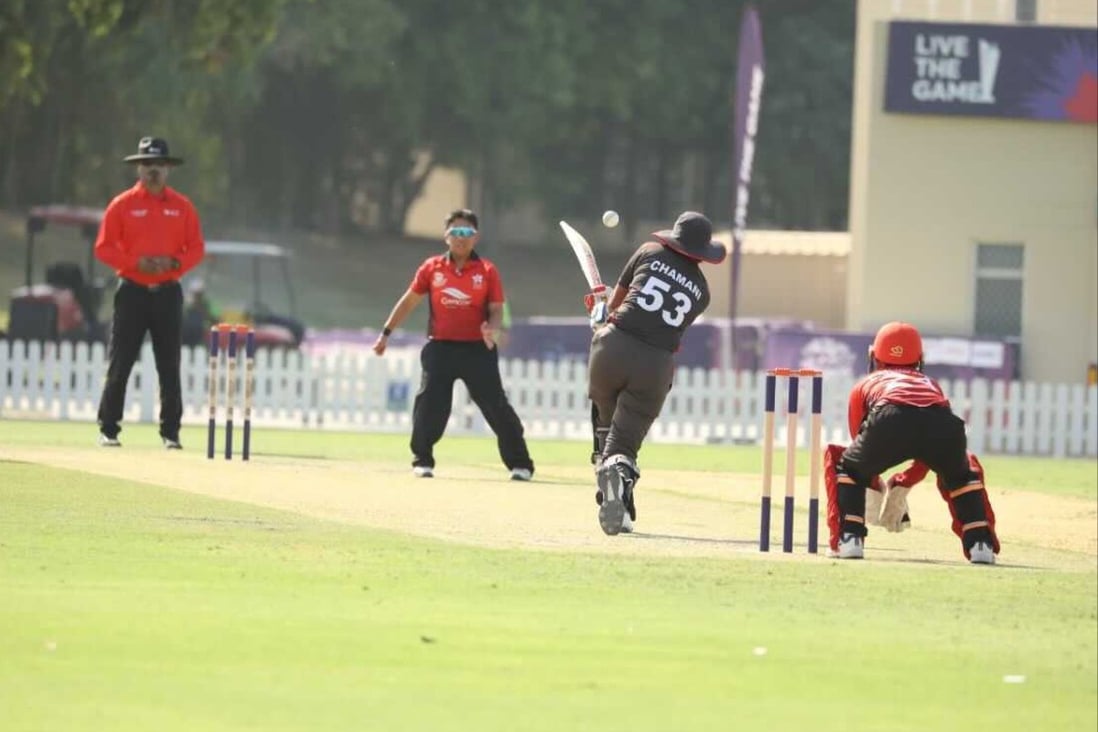 UAE batsman Chamani Seneviratna drives a ball back towards Hong Kong’s Betty Chan during at the ICC Academy grounds in Dubai. Photo: ICC