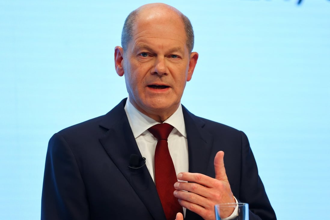 Olaf Scholz delivers a statement after a final round of coalition talks to form a new government, in Berlin, Germany on Wednesday. Photo: Reuters