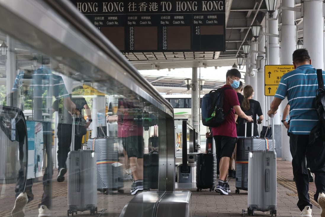 Visitors from mainland China cross the border into Hong Kong at the Shenzhen Bay Port. Photo: K. Y. Cheng