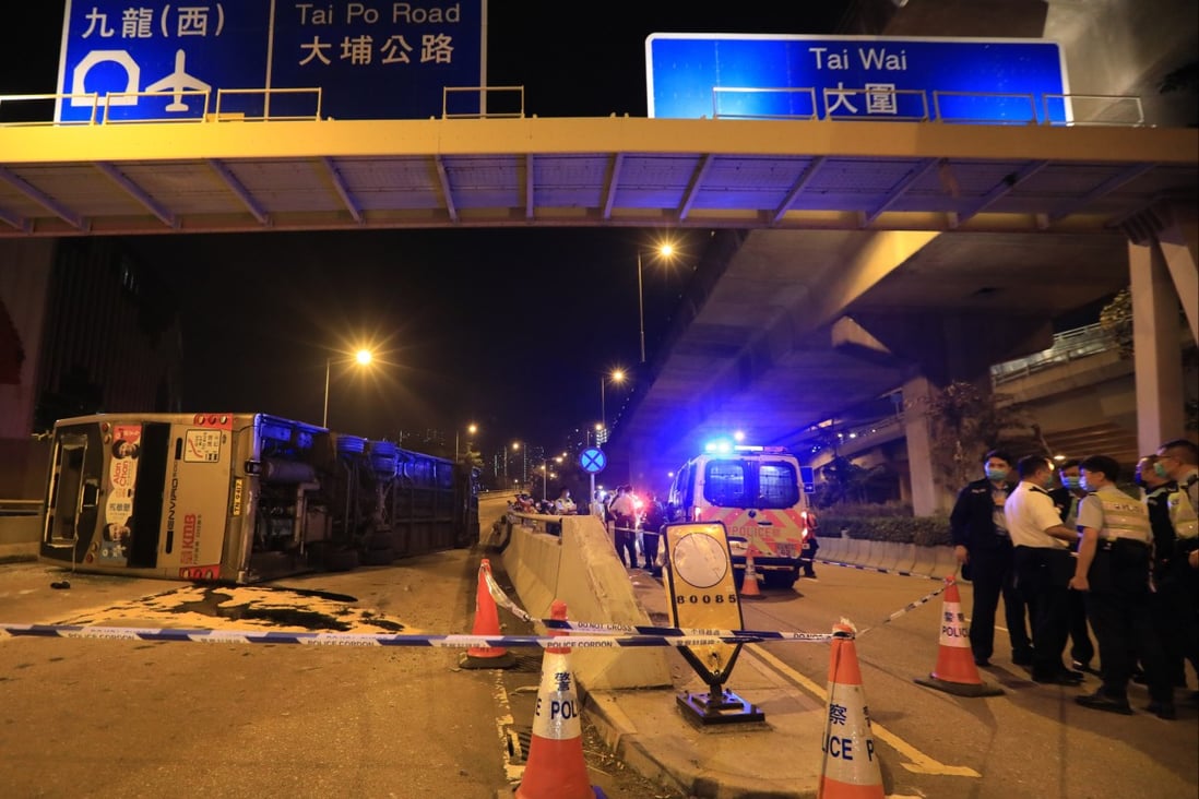 A double-decker bus lies overturned in Tai Wai on November 19. Photo: Felix Wong
