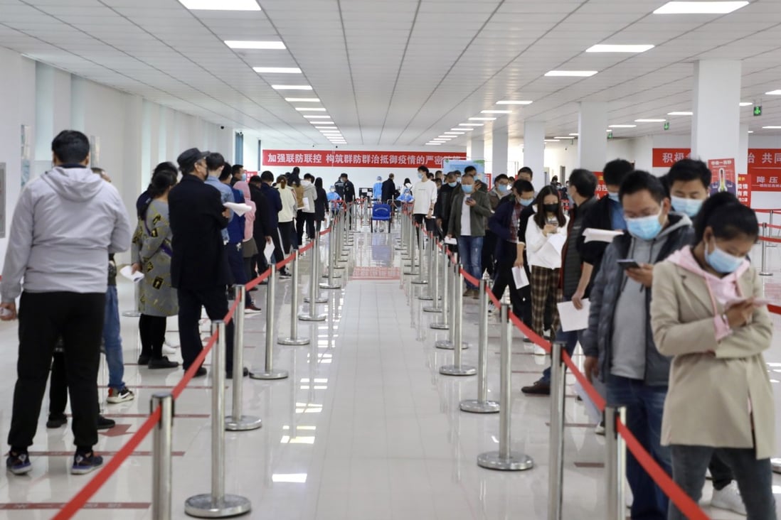 People queue up to receive Covid-19 vaccine booster shots on October 30, 2021, in Beijing, China. Photo: Getty Images