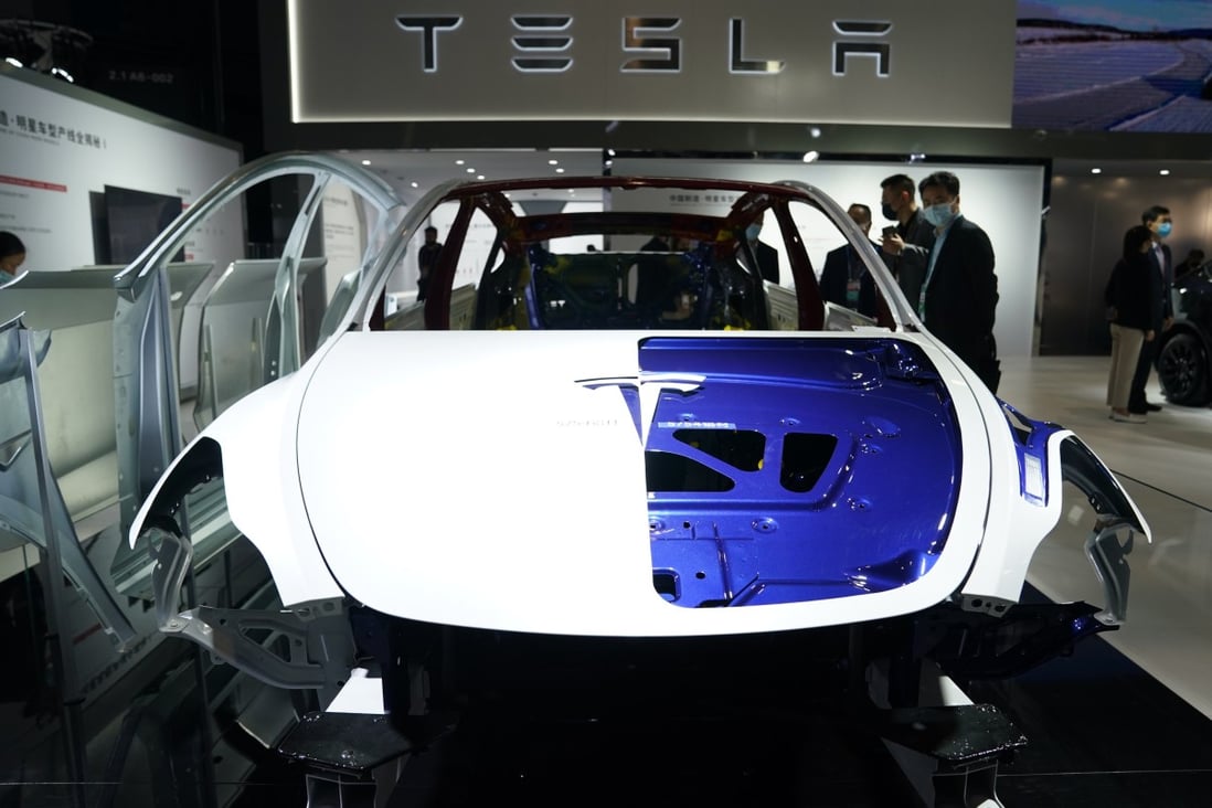 Visitors check Tesla’s booth at the 4th China International Import Expo in Shanghai, on November 5, 2021. Photo: Xinhua