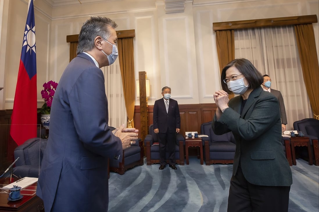 US Representative Mark Takano, left, is greeted by Taiwanese President Tsai Ing-wen at the Presidential Office in Taipei, Taiwan on November 26. Five American lawmakers met with her in a visit intended to reaffirm US support for the self-ruled island. Photo: Taiwan Presidential Office via AP
