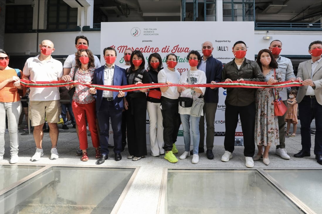 Committee members and partners cut the ribbon at this year’s Italian Charity Fair, organised by the Italian Women’s Association. Photo: Xiaomei Chen
