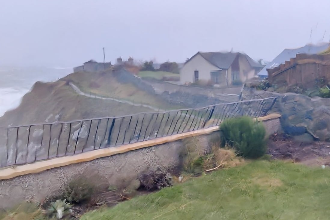 A garden fence blown over by strong winds and rainfall in Portsoy, Aberdeenshire as Storm Arwen hits Scotland on Sunday. Photo: Courtesy @Miss_McF/via Reuters