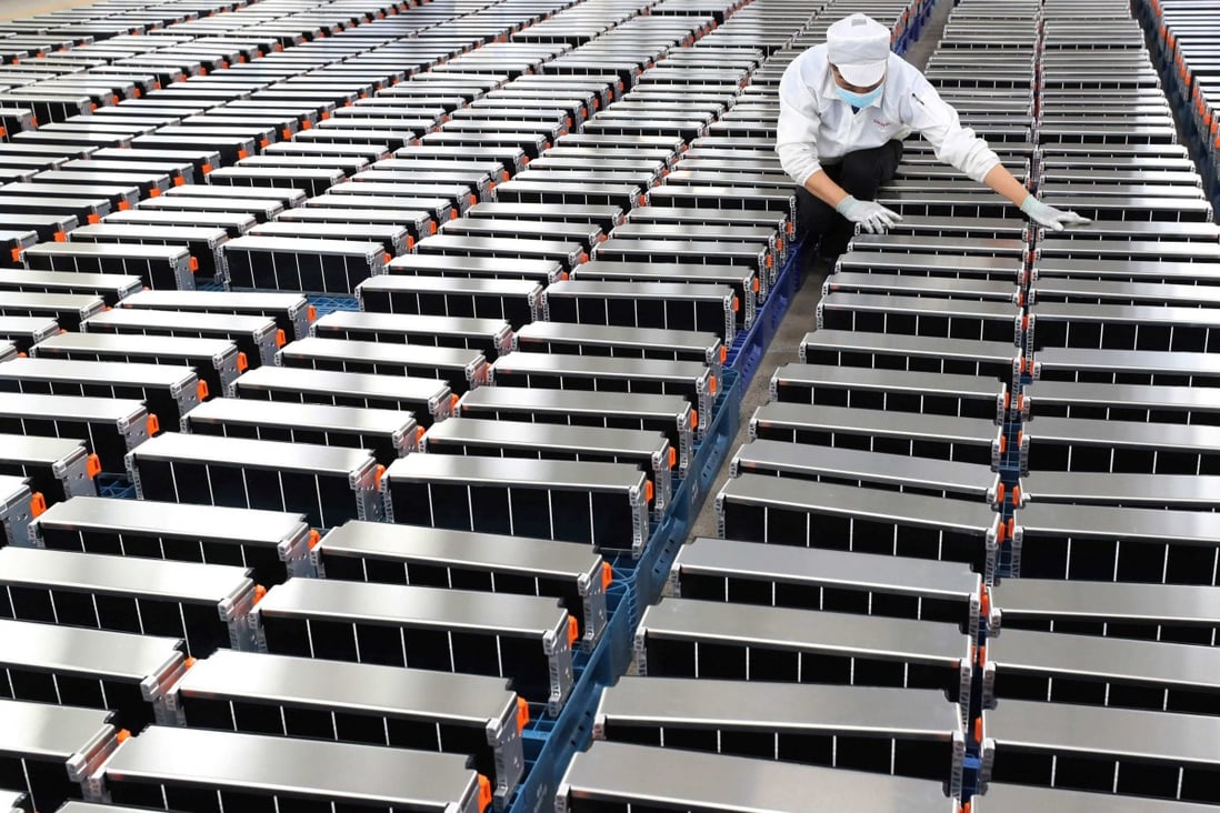 A worker checks car batteries at a factory for Xinwangda Electric Vehicle Battery, which makes lithium batteries for electric cars and other uses, in Nanjing, Jiangsu province, on March 21. Photo: Xinhua