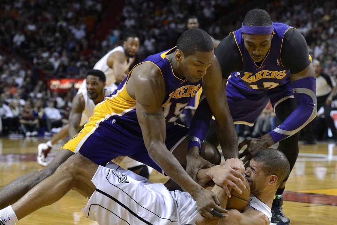 Former Miami Heat forward Shane Battier (bottom) and ex-Los Angeles Laker Metta World Peace (l) have joined the investors in East Asia Super League.  Photo: EPA