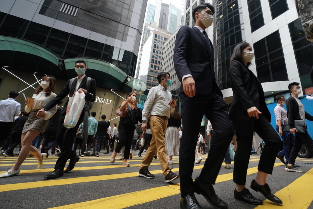 People head to work in Central on May 3, 2021. Allowing the free flow of talent across the region will mean more opportunities for young people and a swifter post-pandemic recovery. Photo: Felix Wong