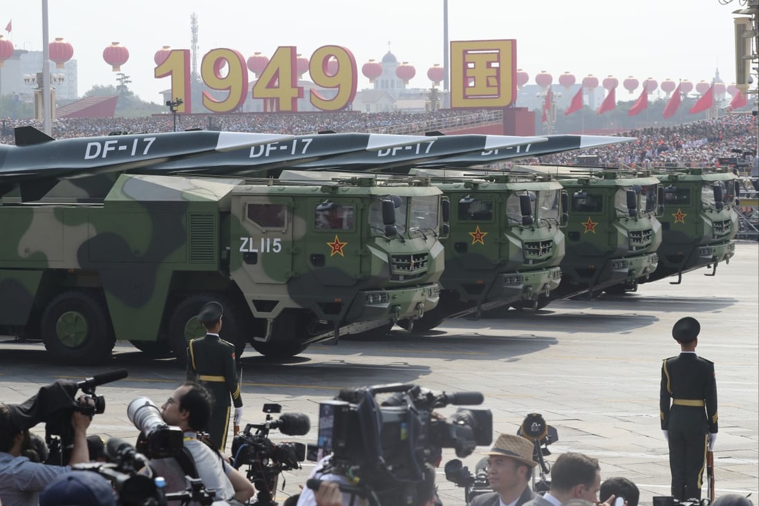 Military vehicles carrying DF-17 missiles are on display during a parade to commemorate the 70th anniversary of the founding of Communist China in Beijing in October 2019. Photo: AP