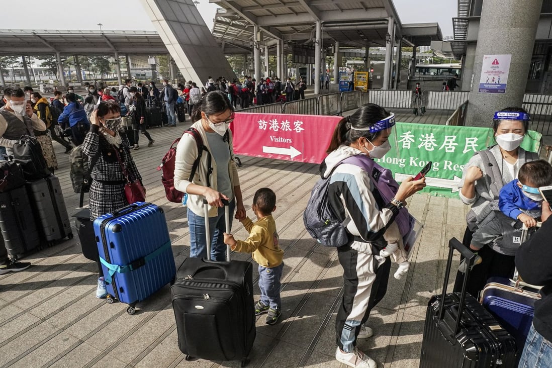 Travellers leaving Hong Kong for mainland China at the Shenzhen border. Photo: Felix Wong