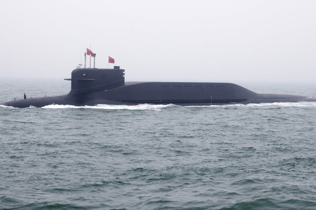 A Chinese submarine is seen in the sea near Qingdao in 2019. Photo: Mark Schiefelbien/AFP via Getty Images)