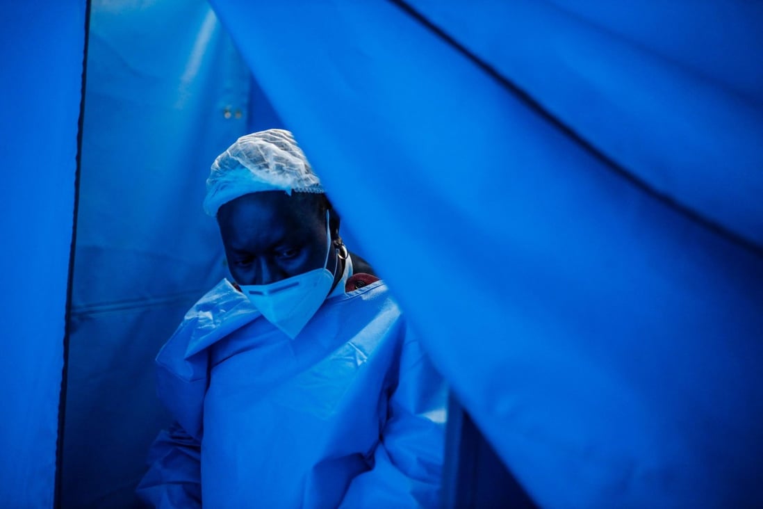 South African nurse  during outbreak of strongly transmissible Omicron variant. Photo: AFP.