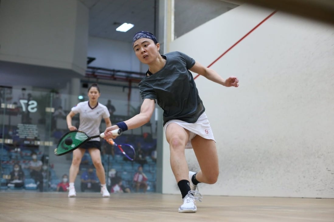 Hong Kong’s Tong Tsz-wing goes for a shot at the 2021 Asian Championships in Kuala Lumpur. Photo: Squash Racquets Association of Malaysia