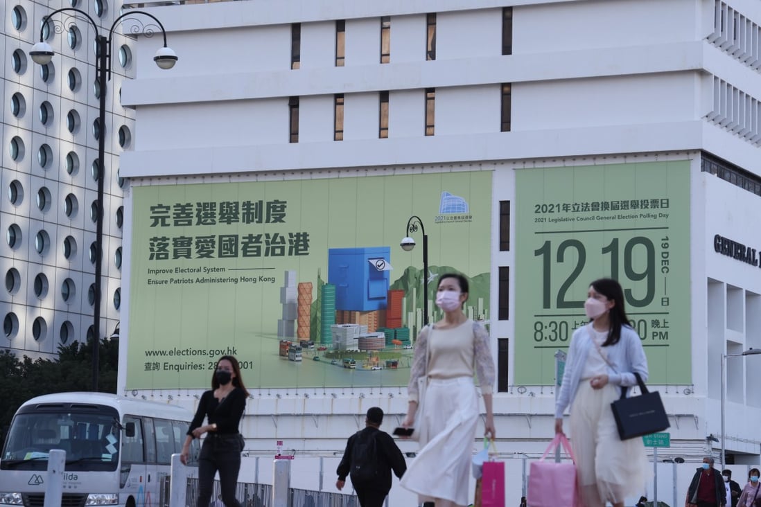 A banner for the Legislative Council General Election is displayed outside the General Post Office in Central on November 28. Photo: May Tse