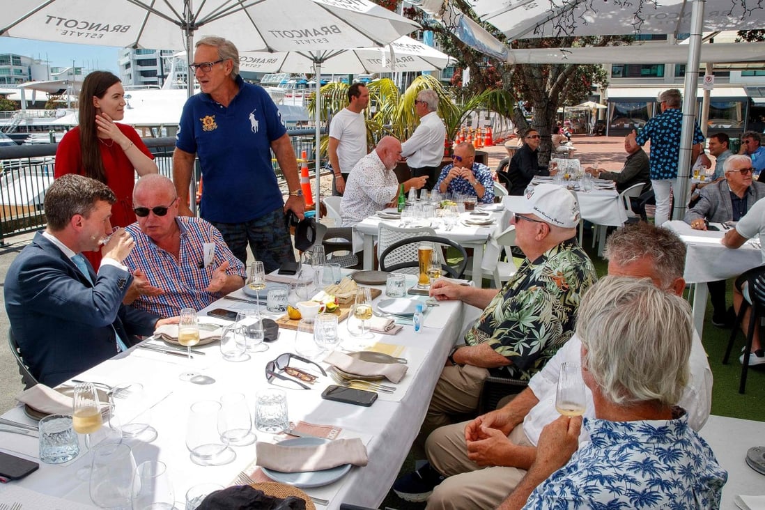Customers dine at a restaurant in Auckland on Friday. Photo: AFP