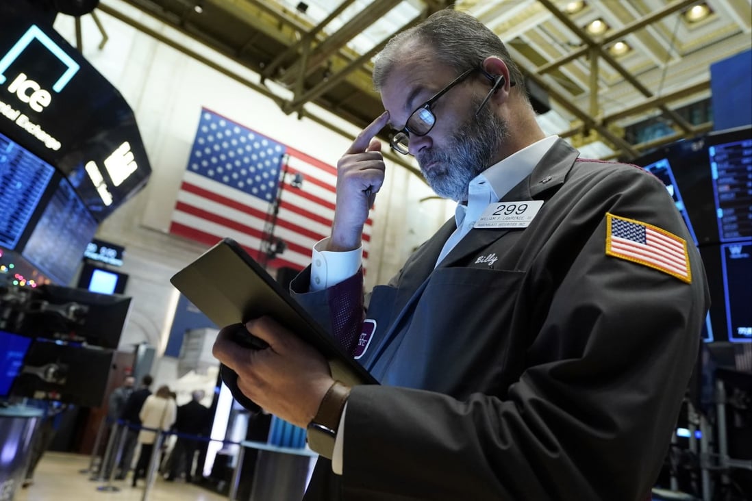 A trader works on the floor of the New York Stock Exchange on Thursday. Photo: AP