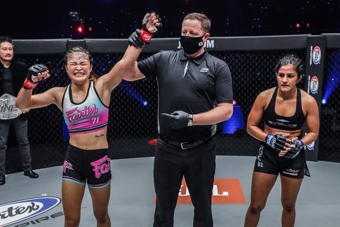 Thailand’s Stamp Fairtex celebrates a submission victory over Ritu Phogat at ONE: Winter Warriors in Singapore. Photos: ONE Championship