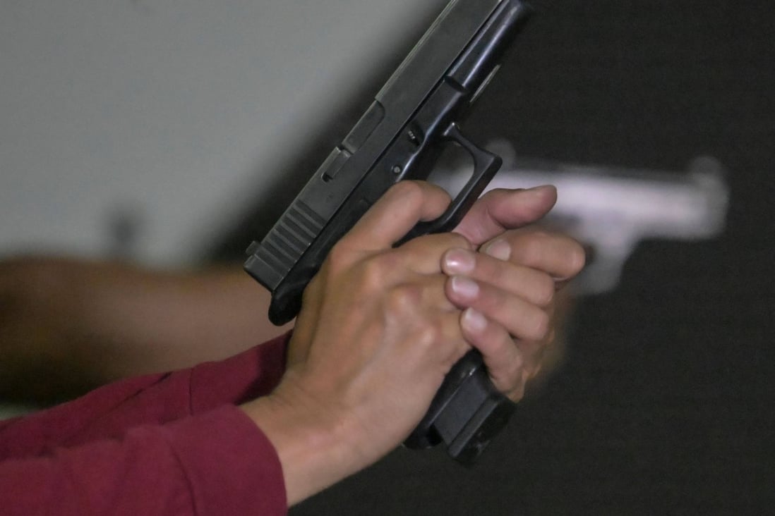A man was arrested after he travelled on a commercial flight from Barbados to Miami with a loaded gun. File photo: AFP