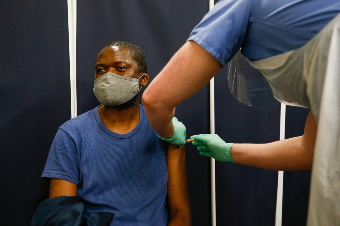 A patient receives the AstraZeneca Covid-19 vaccine in London, UK. Photo: Bloomberg