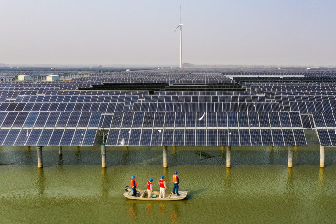 Electricity workers patrolling a photovoltaic and wind power generation project in Sheyanghu Township, Jiangsu province, on November 3. Solar companies have proven to be a safer bet for investors fleeing from falling tech stocks. Photo: Xinhua