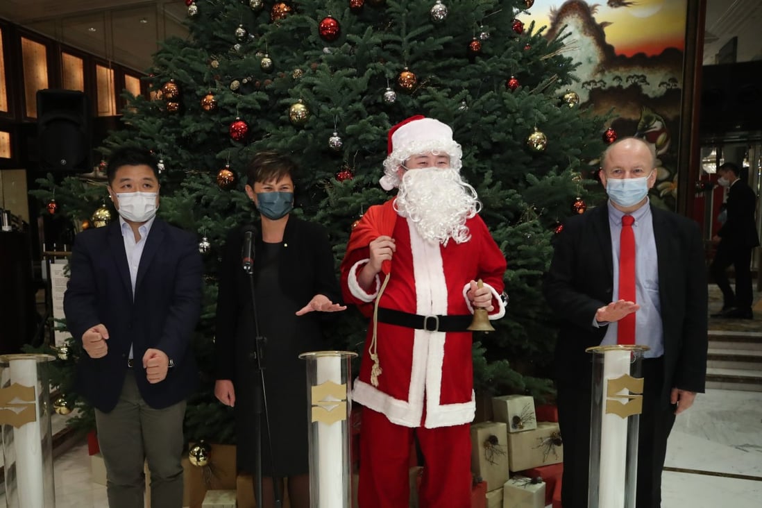 Kowloon Shangri-La hotel manager Ghislaine Lê (second left) prepares to light the hotel’s Christmas tree last week, alongside the Post’s senior CSR manager Lawrence Wong (left) and RTHK English programming head Hugh Chiverton (right). Photo: Edmond So