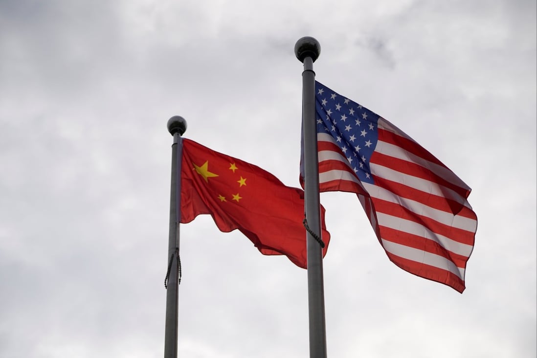 The Chinese and American flags. Power in Asia is increasingly a two-horse race, according to a new report. Photo: Reuters