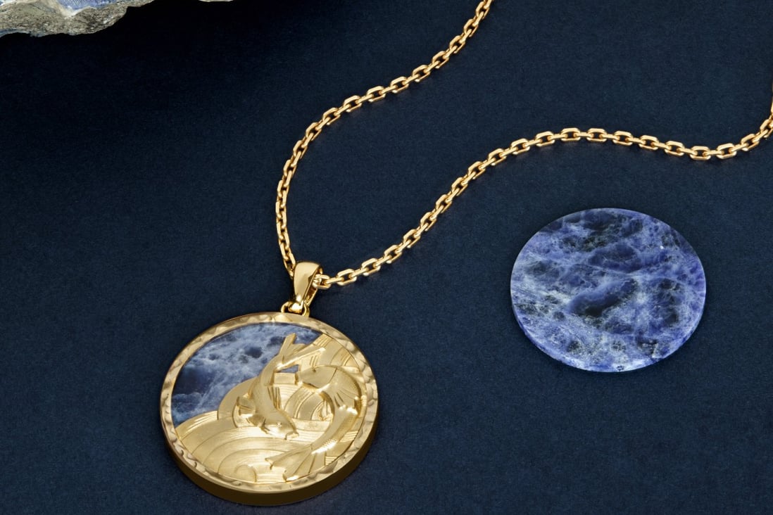 Van Cleef & Arpels Zodiaque Piscium necklace, with its sodalite background evoking the ocean depths. Photo: Van Cleef & Arpels