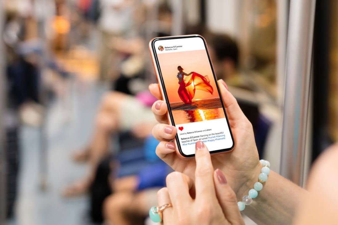 Generic Instagram pix
Royalty-free stock photo ID: 1593820033 Woman riding in metro and viewing someone’s photo on mobile phone. Photo: Shutterstock
