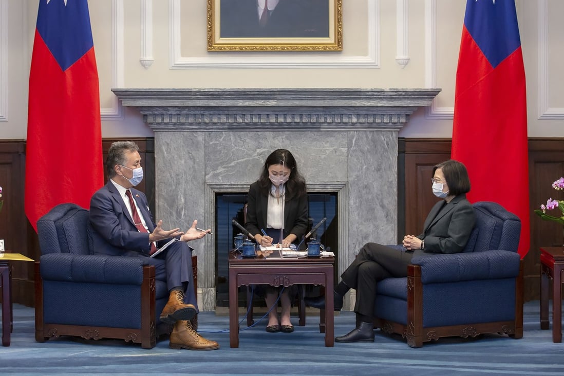 US Representative Mark Takano chats with Taiwanese President Tsai Ing-wen at the Presidential Office in Taipei on November 26. Five US lawmakers met with Tsai in a surprise one-day visit intended to reaffirm the United States’ “rock solid” support for the self-governing island. Photo: Taiwan Presidential Office via AP