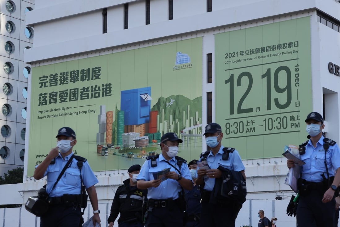 Police officers are seen outside the General Post Office in Central on November 28. Photo: May Tse
