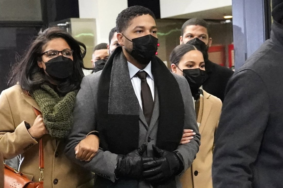 Actor Jussie Smollett leaves the courthouse with his siblings after being convicted on five of six charges against him. Photo: AP
