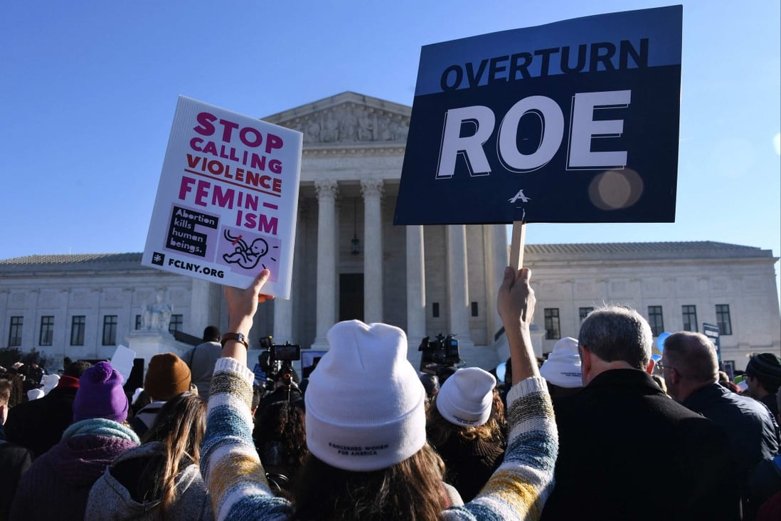 Abortion rights advocates and anti-abortion protesters demonstrate in front of the US Supreme Court in Washington on December 1. Photo: AFP