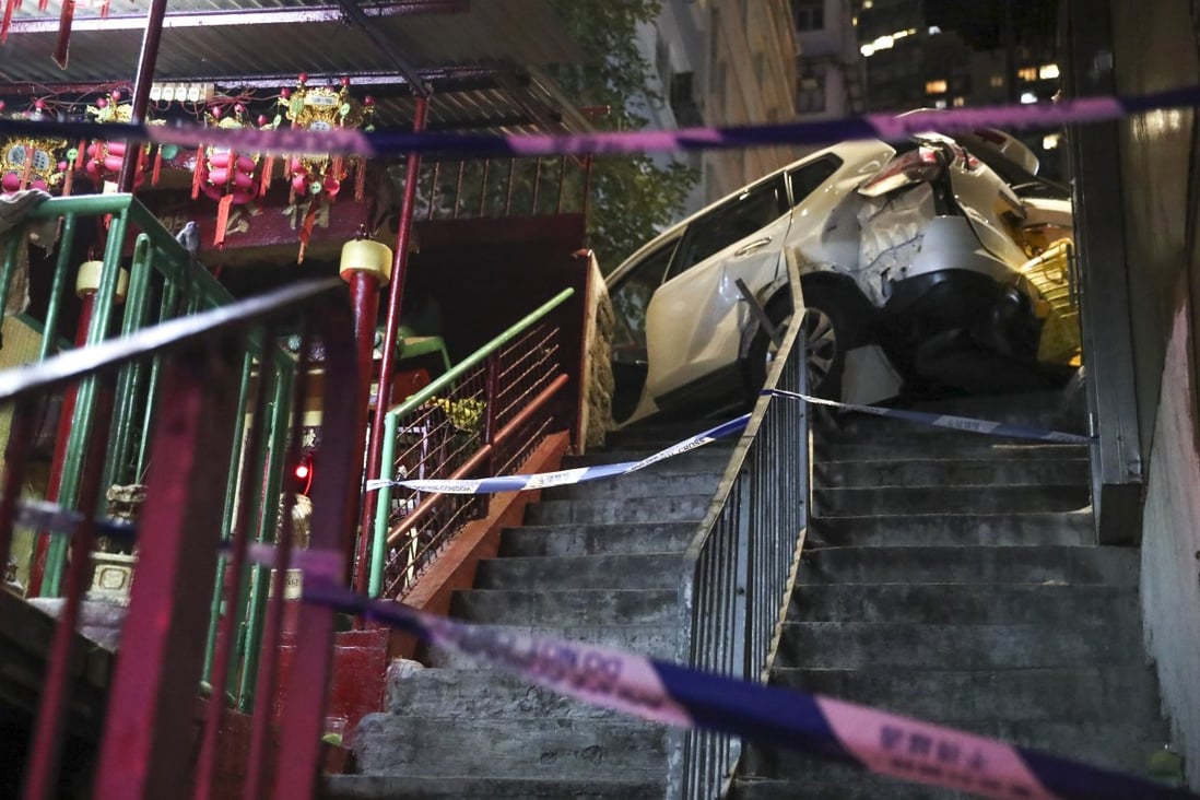 The crumpled car after it slammed into a lamp post in SoHo in Central on Friday night. Photo: Edmond So