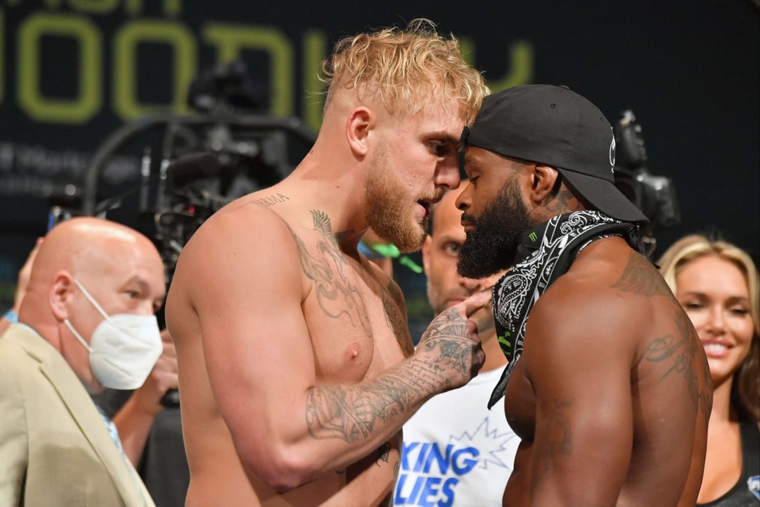 Jake Paul and Tyron Woodley face off during the weigh in before their fight in August. Photo: Getty Images