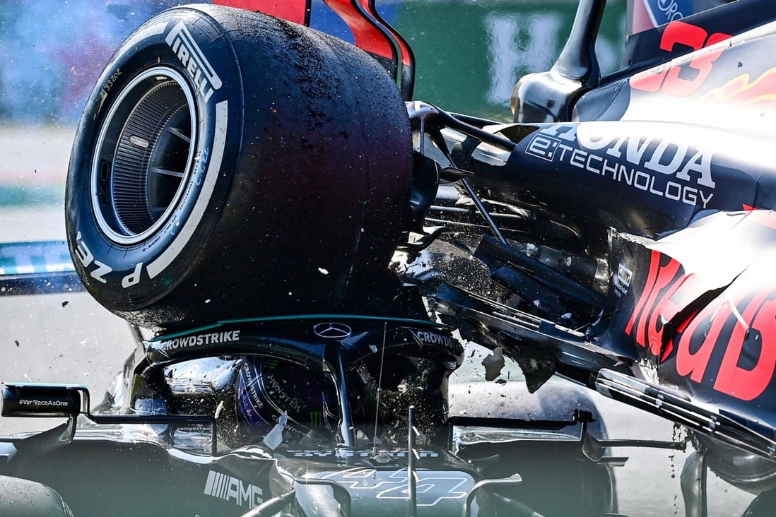 Lewis Hamilton (left) and Red Bull’s Max Verstappen collide during the Italian Formula One Grand Prix. Photo: AFP