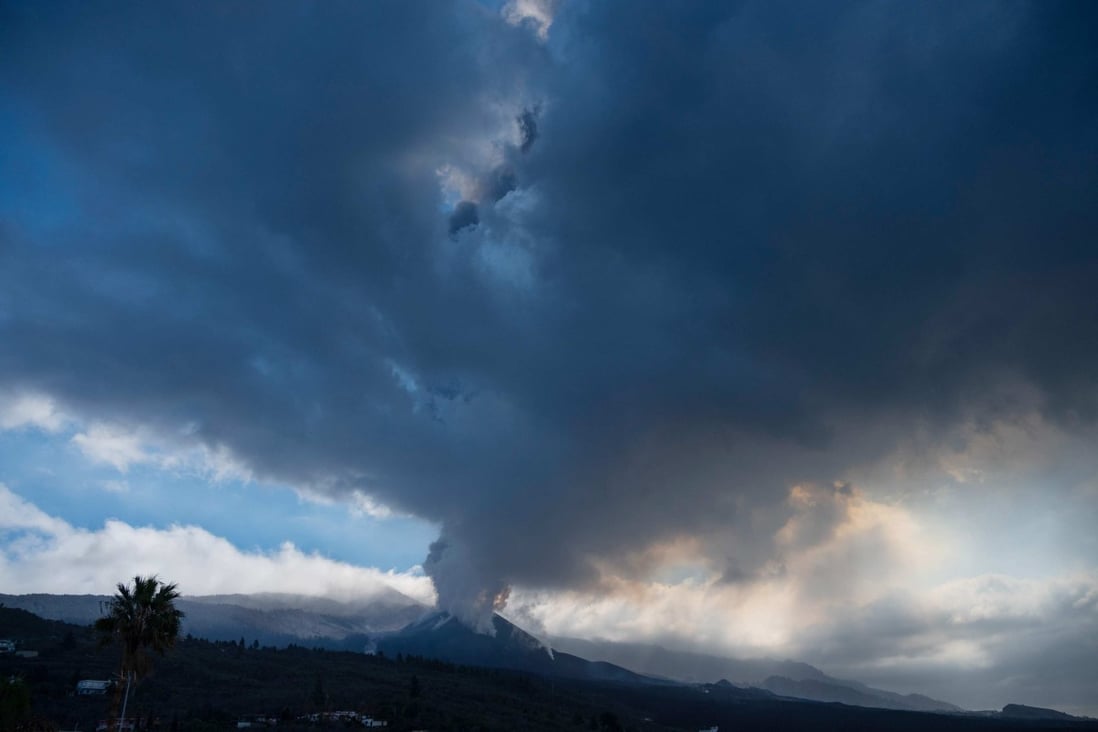 The Cumbre Vieja volcano, pictured from El Paso, spews ash and smoke on the Canary island of La Palma on Sunday. Photo: AFP