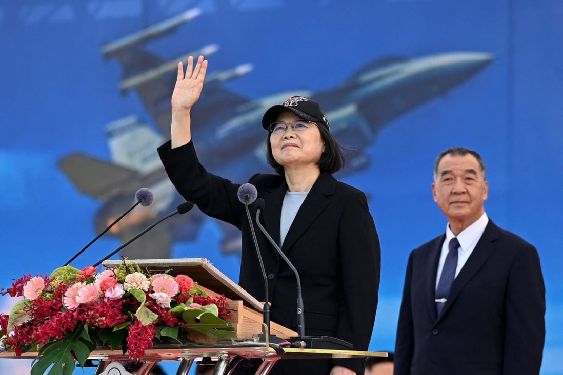 Taiwanese President Tsai Ing-wen waves at a US-made fighter plane as Defence Minister Chiu Kuo-cheng looks on,   at the Chiayi Air Base in southern Taiwan on November 18. Photo: AFP 