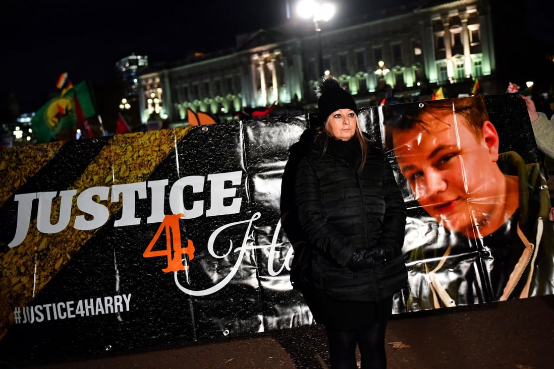 Harry Dunn’s mother Charlotte Charles poses in front of a banner outside Buckingham Palace as people demonstrate during US President Donald Trump’s visit to London in December 2019. Photo: Reuters