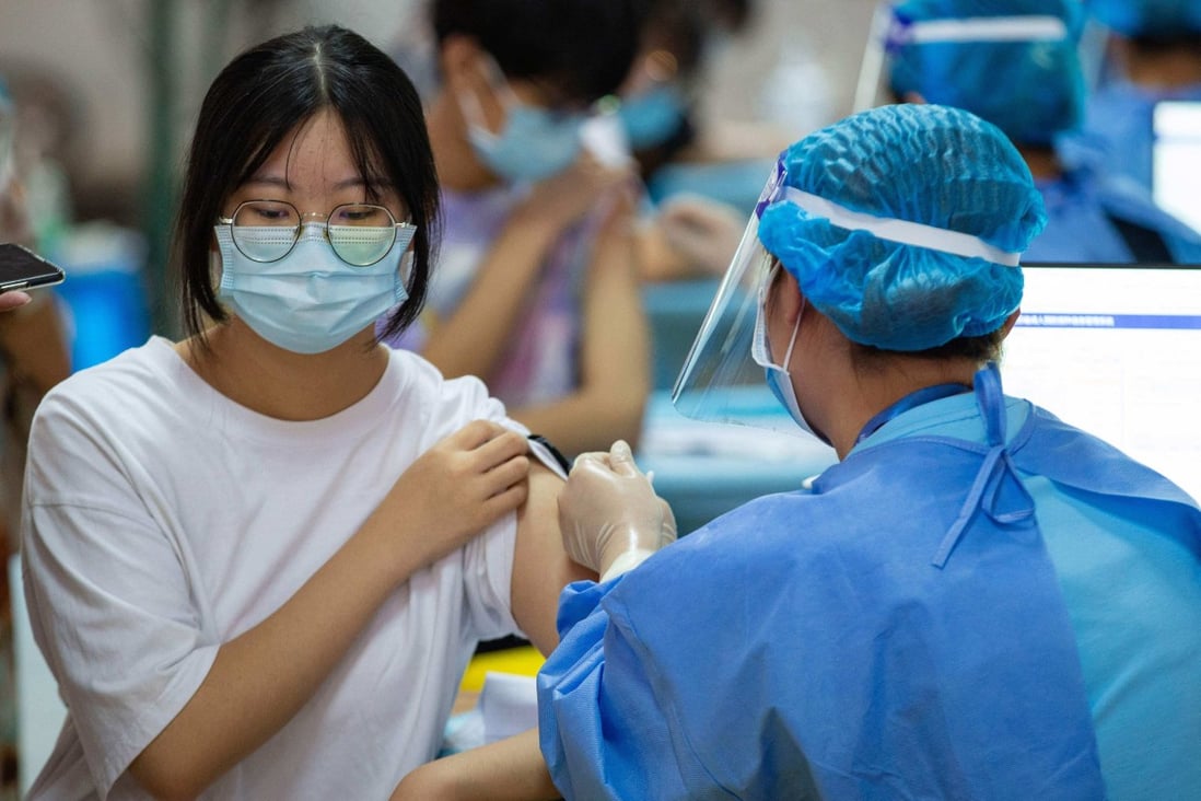 A high school student receives the Sinovac Covid-19 vaccine in Nanjing, in China’s eastern Jiangsu province. Photo: AFP