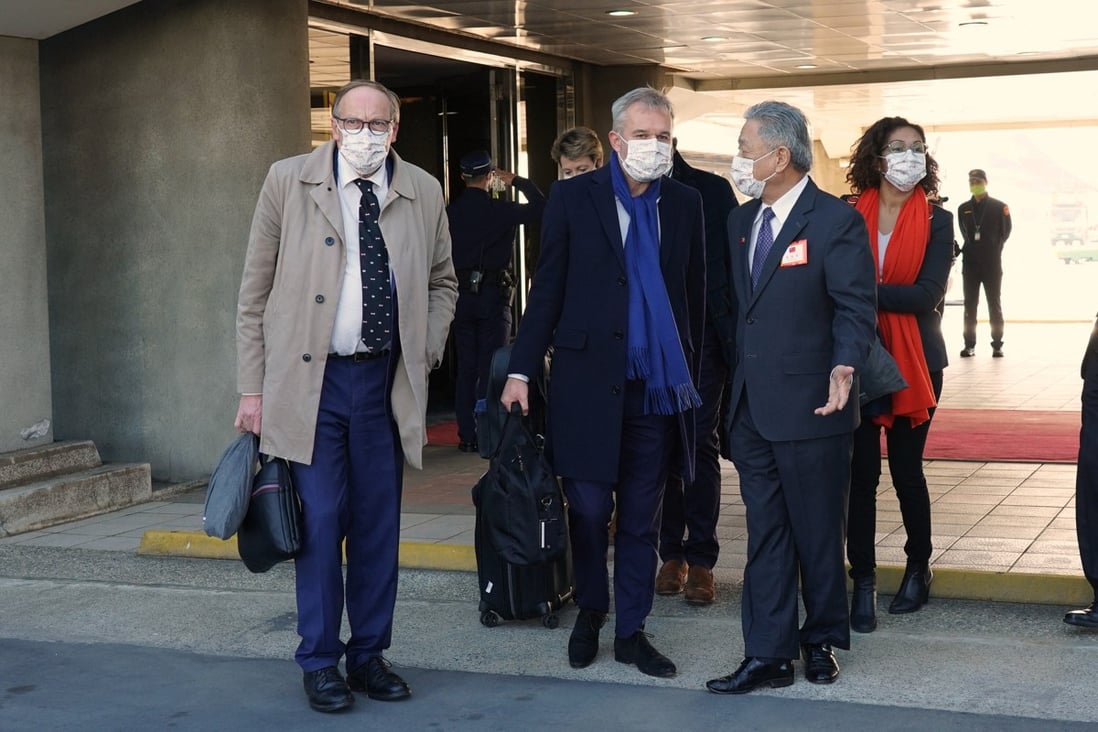 Francois de Rugy (centre), a member of the French National Assembly, arrives at  Taoyuan International Airport in Taiwan on Wednesday. Photo: AFP