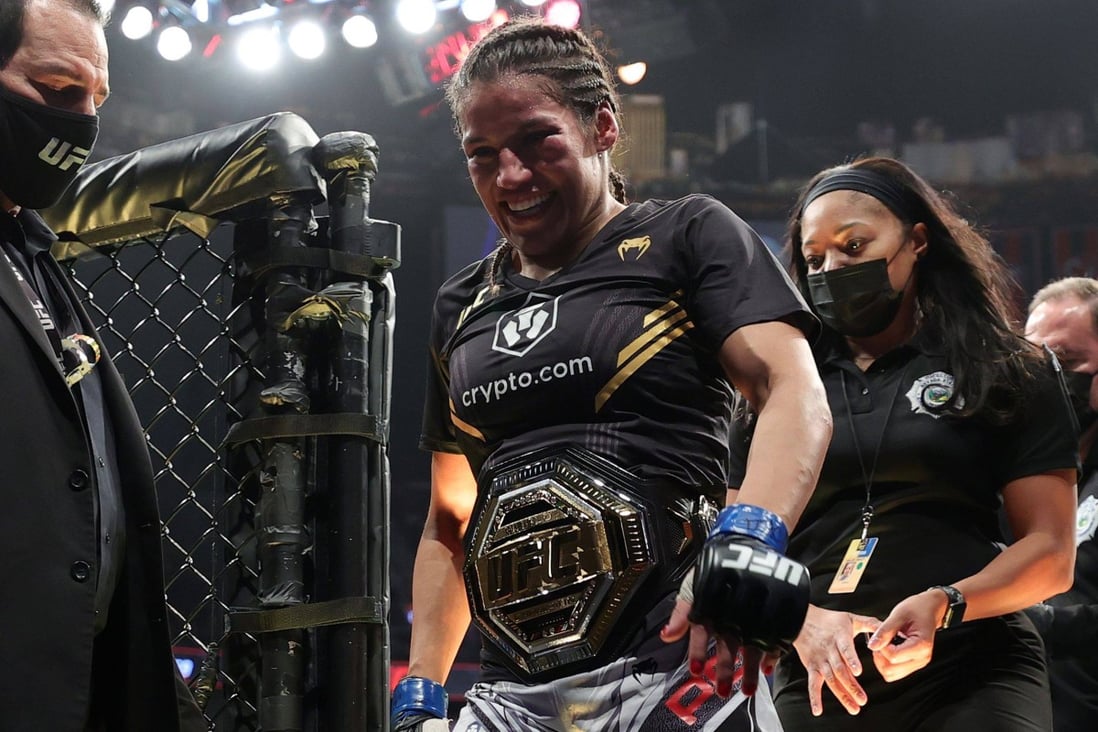 Julianna Pena celebrates after defeating Amanda Nunes to win the women’s bantamweight title at UFC 269. Photo: Carmen Mandato/Getty Images/AFP