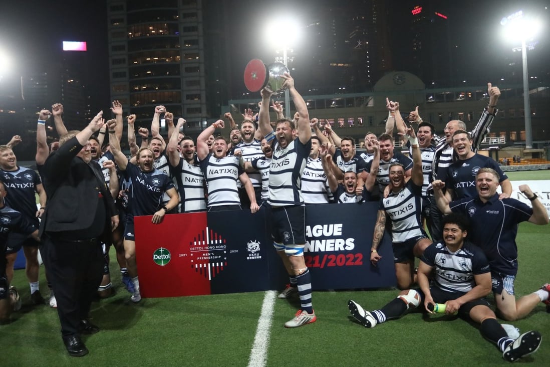 Hong Kong Football Club skipper Josh Hrstich lifts the Dettol Men’s Premiership trophy after his side’s 49-13 win over Kowloon at Happy Valley. Photo: Jonathan Wong