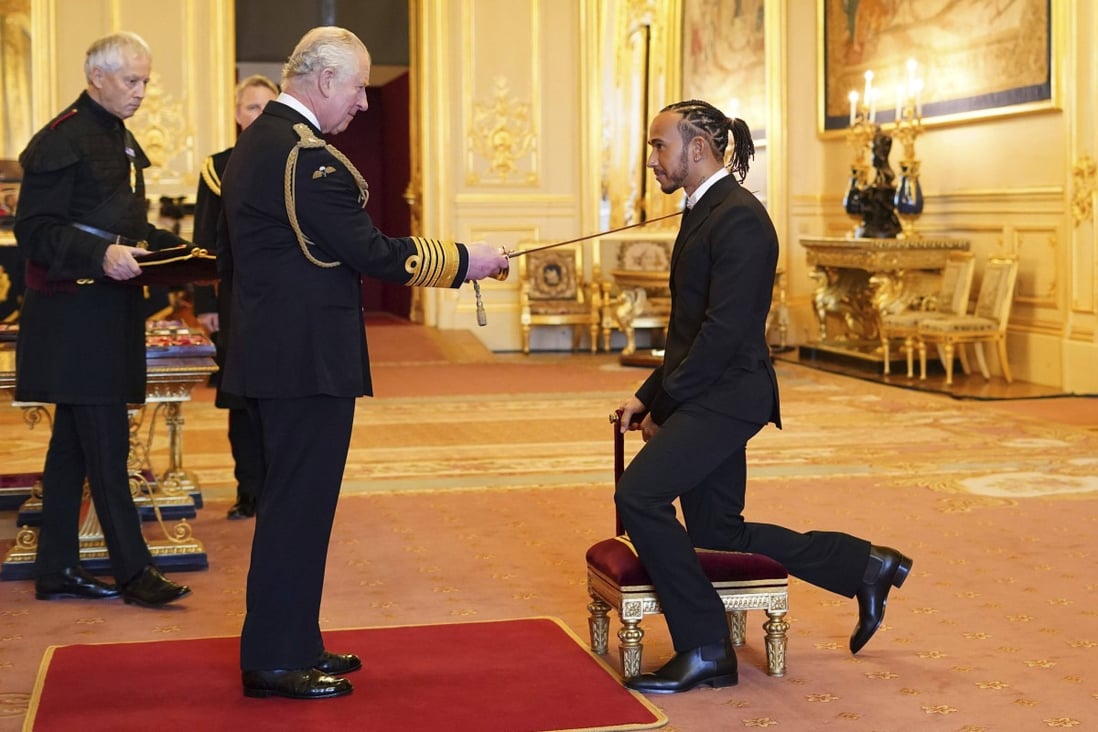 Lewis Hamilton is made a Knight Bachelor by Prince Charles at Windsor Castle. Photo: AP