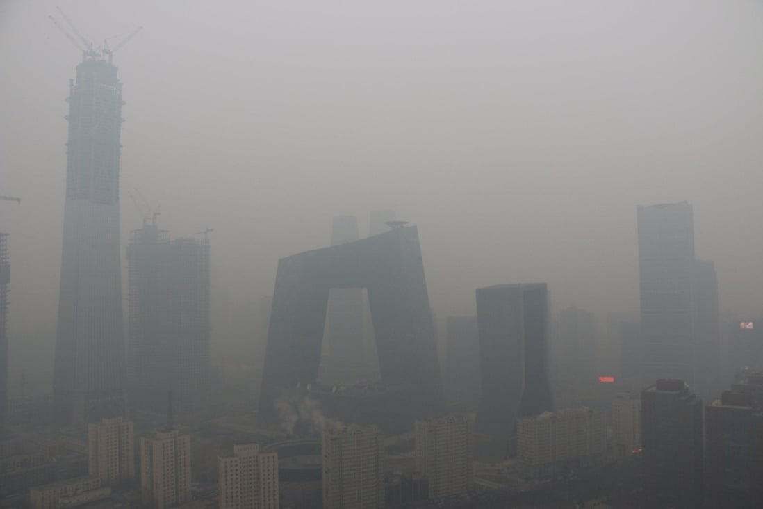 Buildings shrouded in smog during a heavily polluted day in Beijing. Photo: Reuters