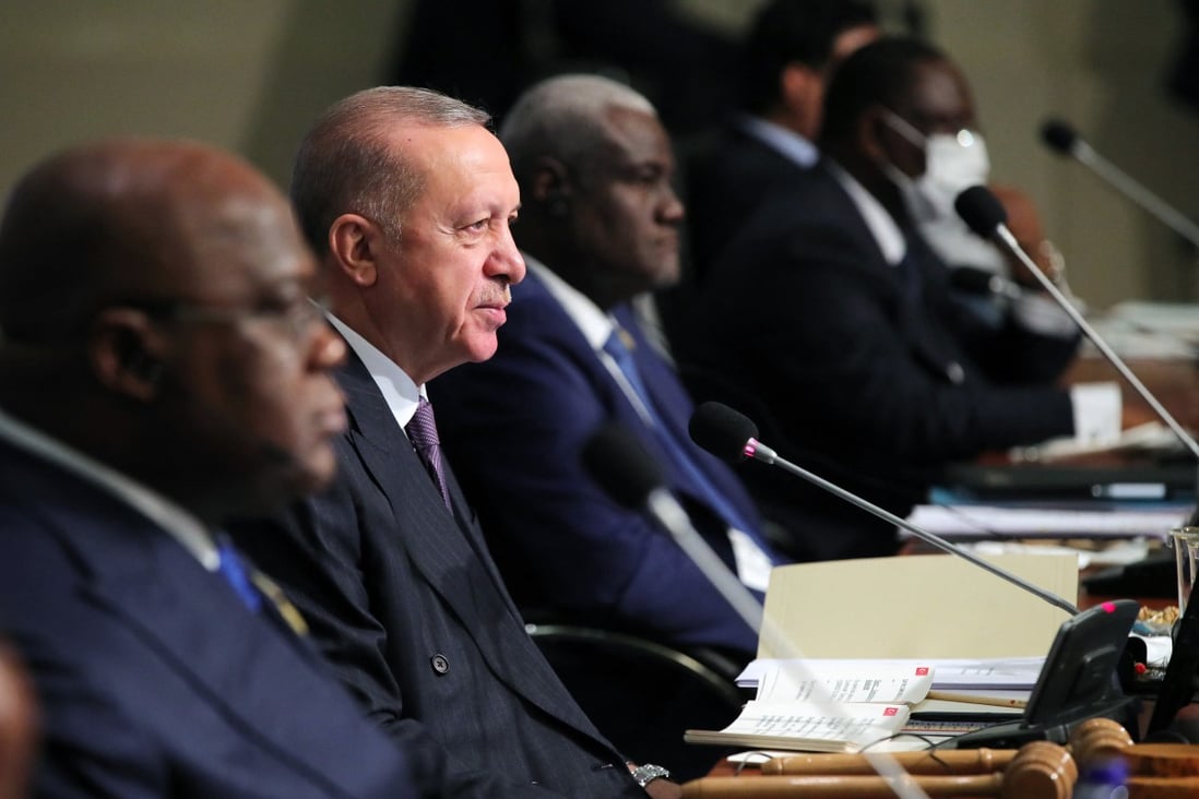 Turkish President Recep Tayyip Erdogan (C) gives a speech at the opening session of the 3rd Turkey-Africa Partnership Summit in Istanbul on December 18. Photo: Turkish Presidential Press Service via AFP