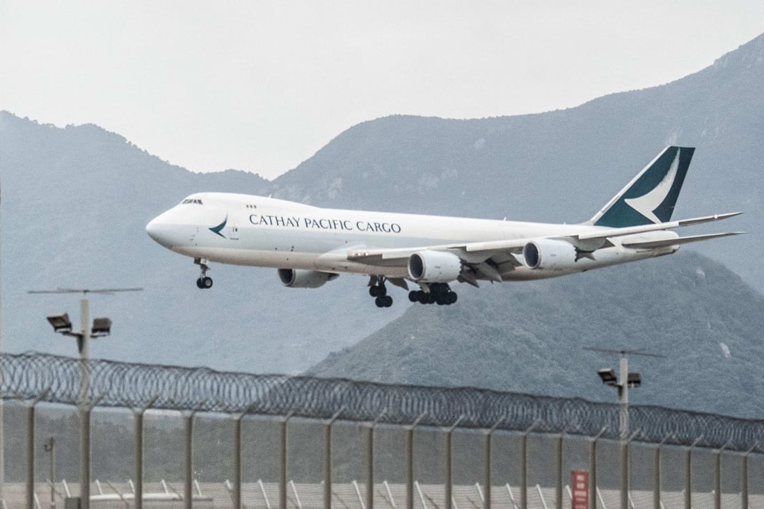 A Cathay Pacific cargo plane prepares to land at Hong Kong International Airport. Photo: AFP