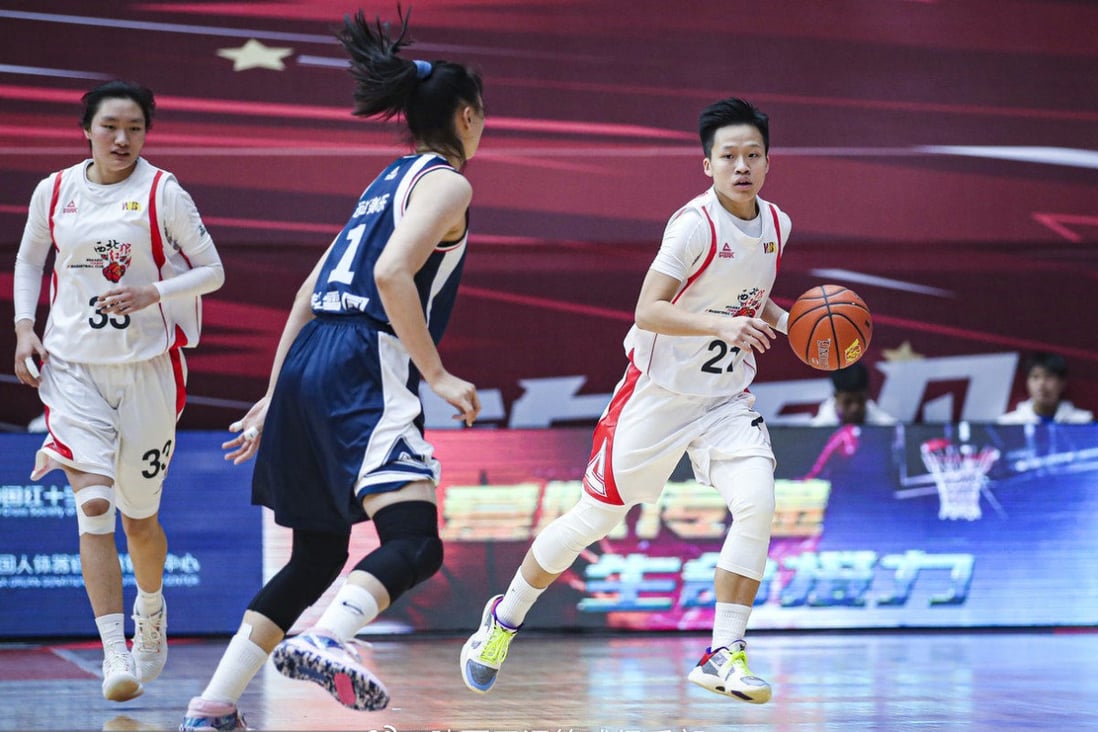 Li Tsz-kwan (right), the city’s first and only female professional basketball player, in action in a WCBA game. Photo: Osports