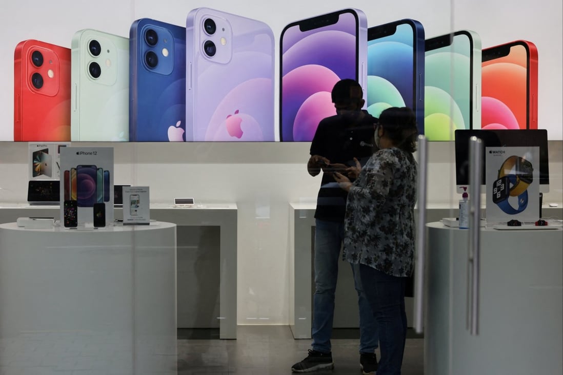 A salesperson and customer at an Apple reseller store in Mumbai, India. Some of Apple’s phones are assembled in the country through manufacturing partners like Foxconn. Photo: Reuters

