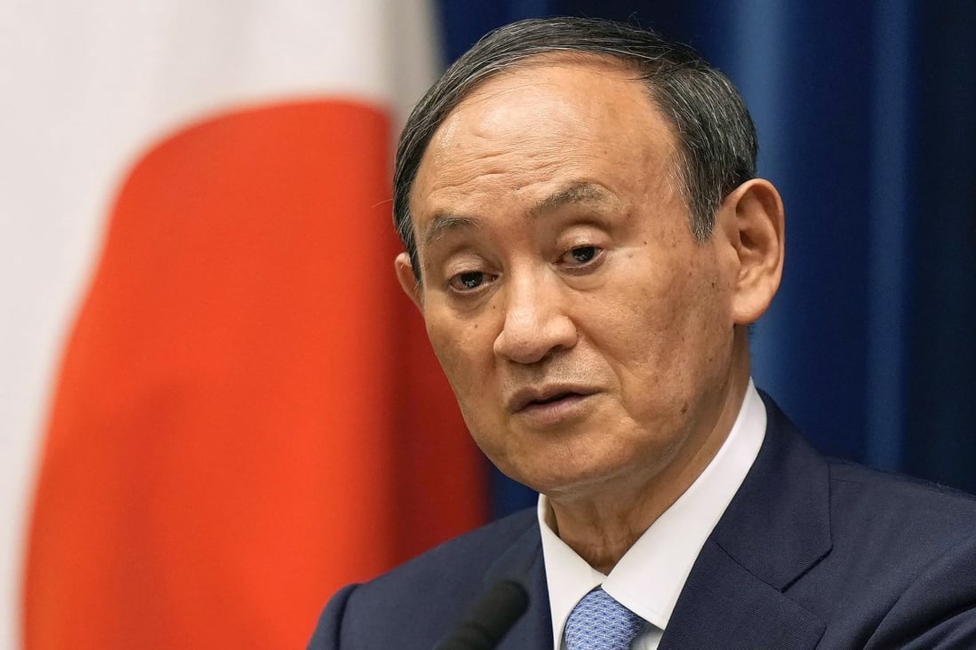 Former prime minister Yoshihide Suga told a newspaper that he hopes Japan and China can overcome their difficulties and forge a better working relationship. Photo: AP